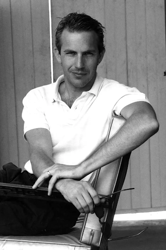  In an old headshot Kevin Costner 

